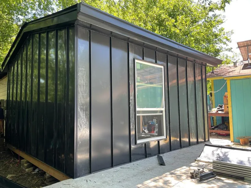 Black standing seam metal wall panels for Roof Inspection in East Lampeter